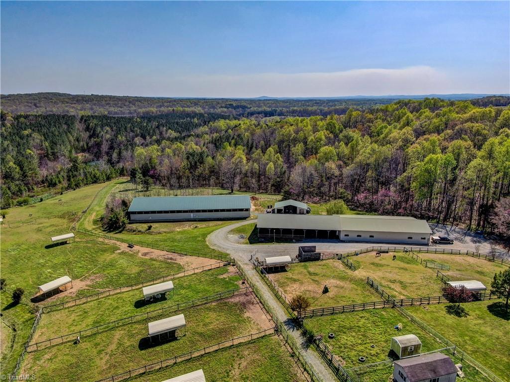 6010 Sandy Creek Church Road Staley, NC 27355 - Photo 27 of 38 View of pastures, barn, covered arena