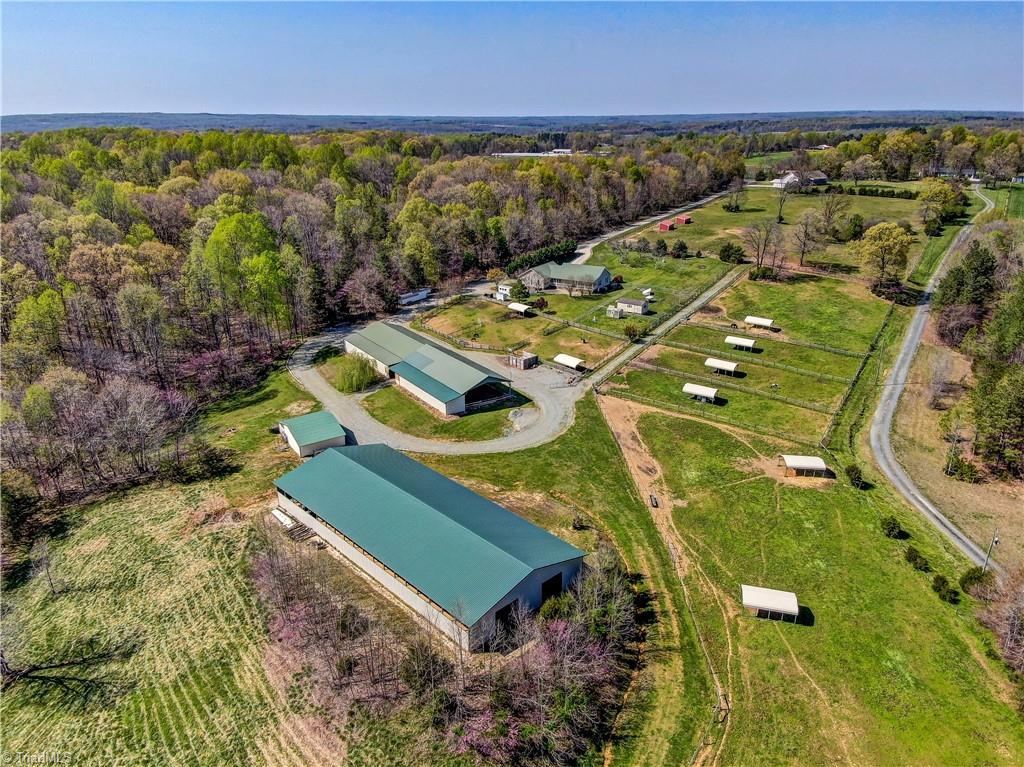 6010 Sandy Creek Church Road Staley, NC 27355 - Photo 36 of 38 Barn, arena, and pastures