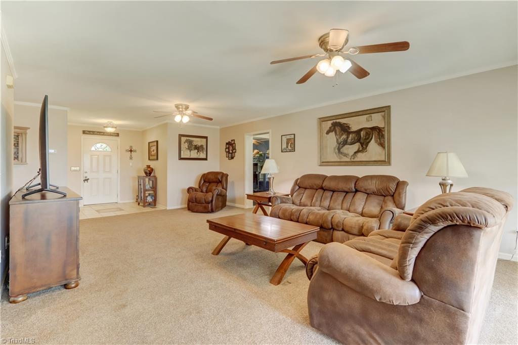6010 Sandy Creek Church Road Staley, NC 27355 - Photo 7 of 38 View of entranceway into the living area