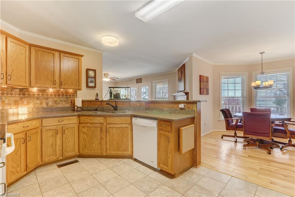 6010 Sandy Creek Church Road Staley, NC 27355 - Photo 10 of 38 Kitchen overlooking lovely breakfast area