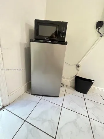 a view of a utility room with a sink