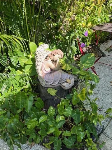 a view of yard with outdoor seating