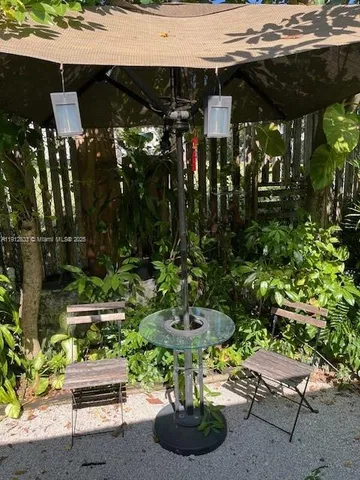 a view of a pathway both side of yard