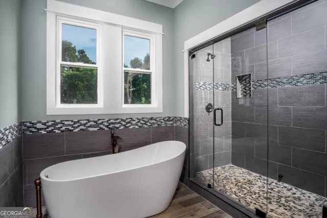 a front view of a house with yard