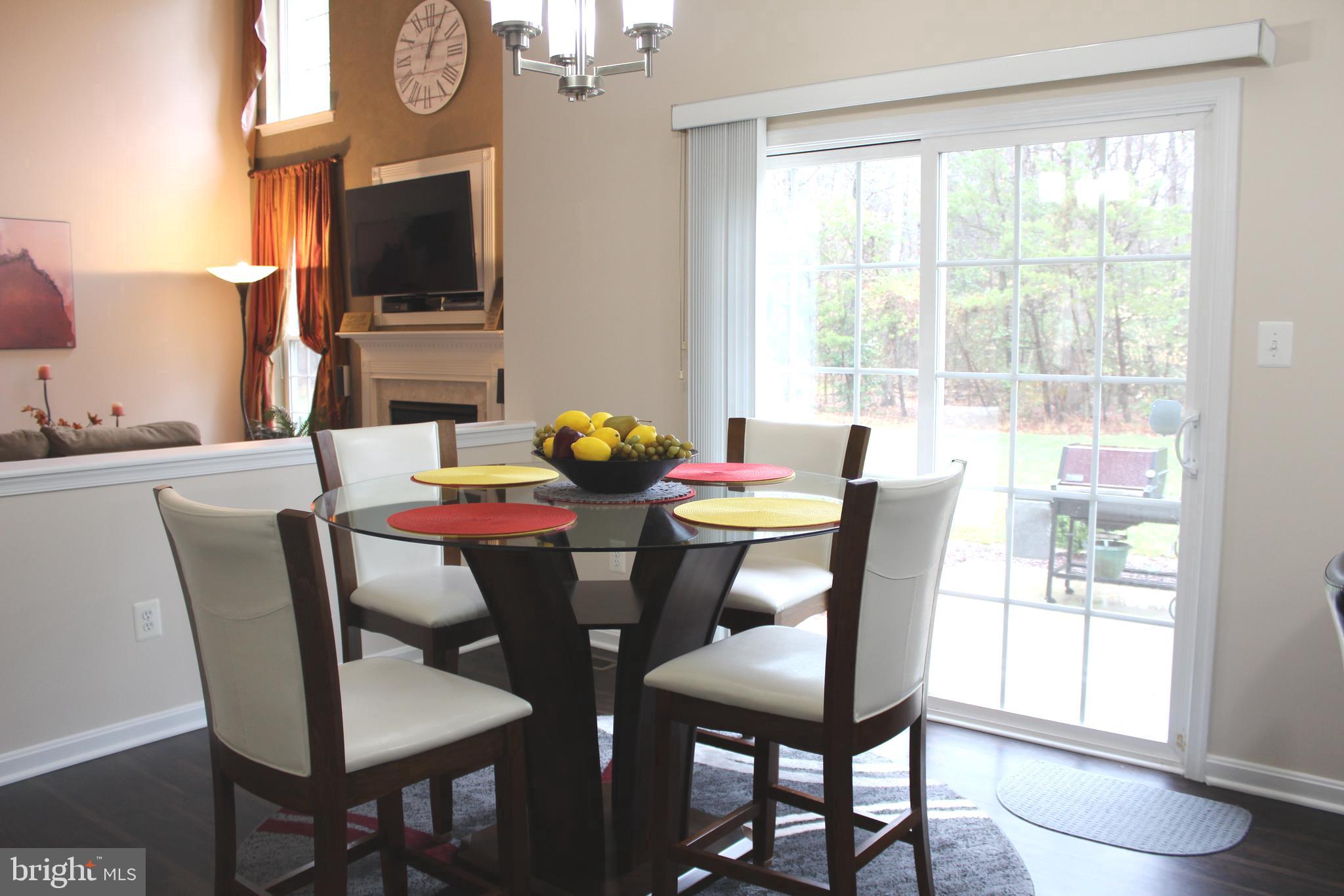 3470 Malcolm Road Brandywine, MD 20613 - Photo 16 of 55 a view of a dining room with furniture and a window