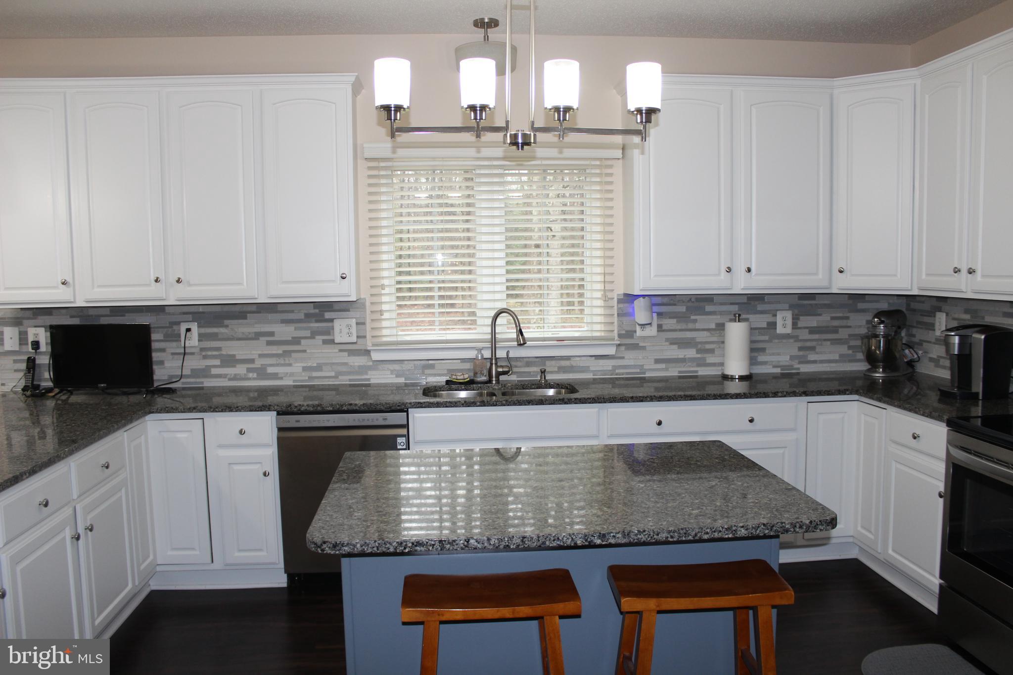 3470 Malcolm Road Brandywine, MD 20613 - Photo 17 of 55 a kitchen with sink cabinets and window