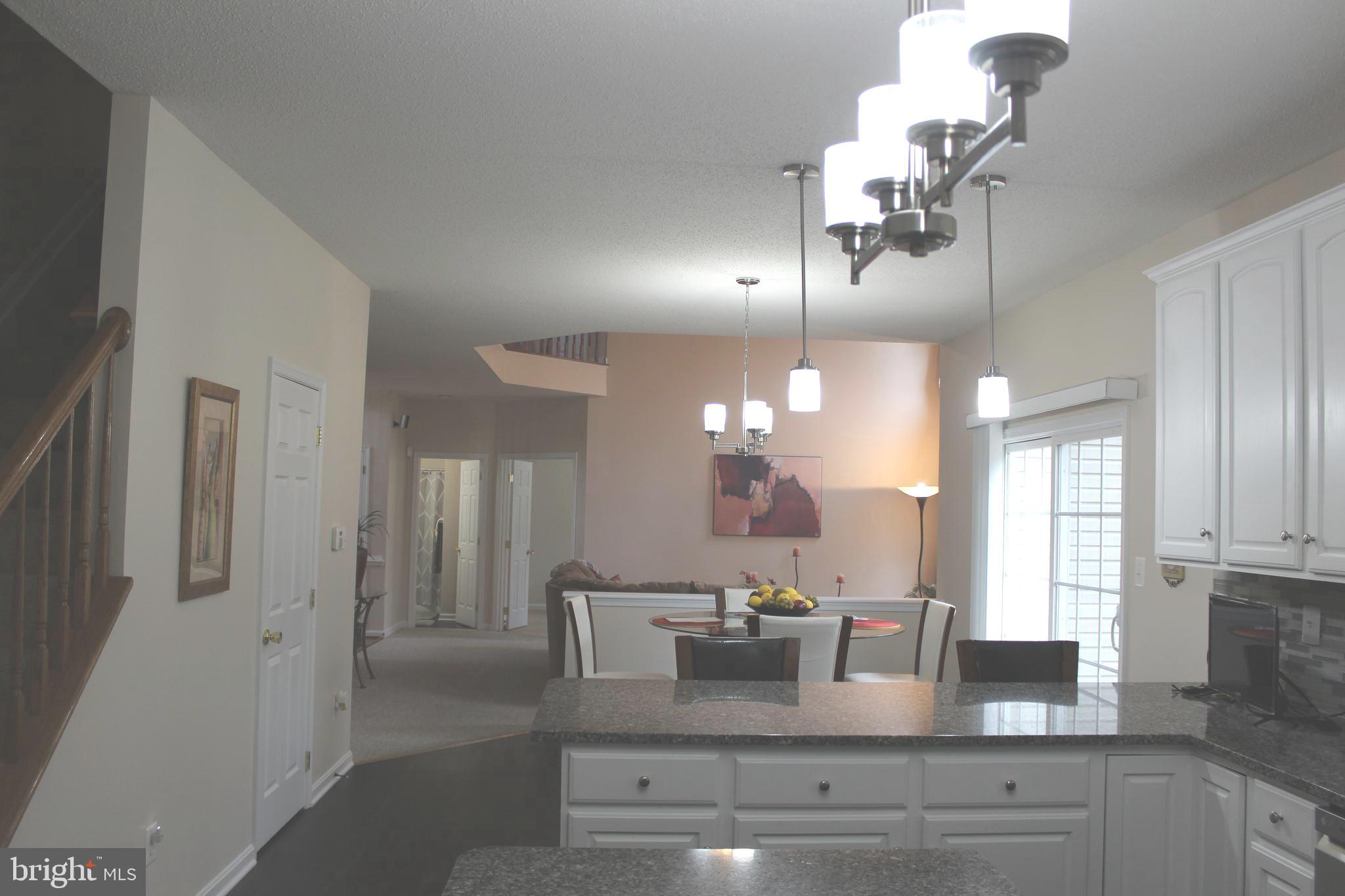 3470 Malcolm Road Brandywine, MD 20613 - Photo 19 of 55 a view of living room and chandelier
