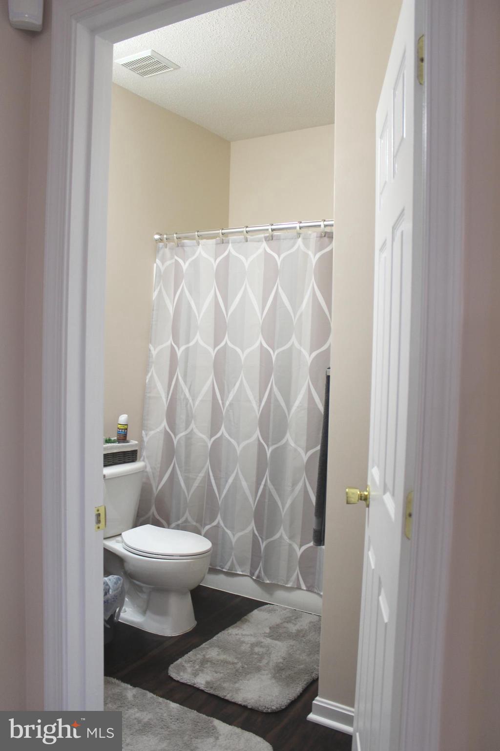 3470 Malcolm Road Brandywine, MD 20613 - Photo 24 of 55 a bathroom with a toilet and a shower