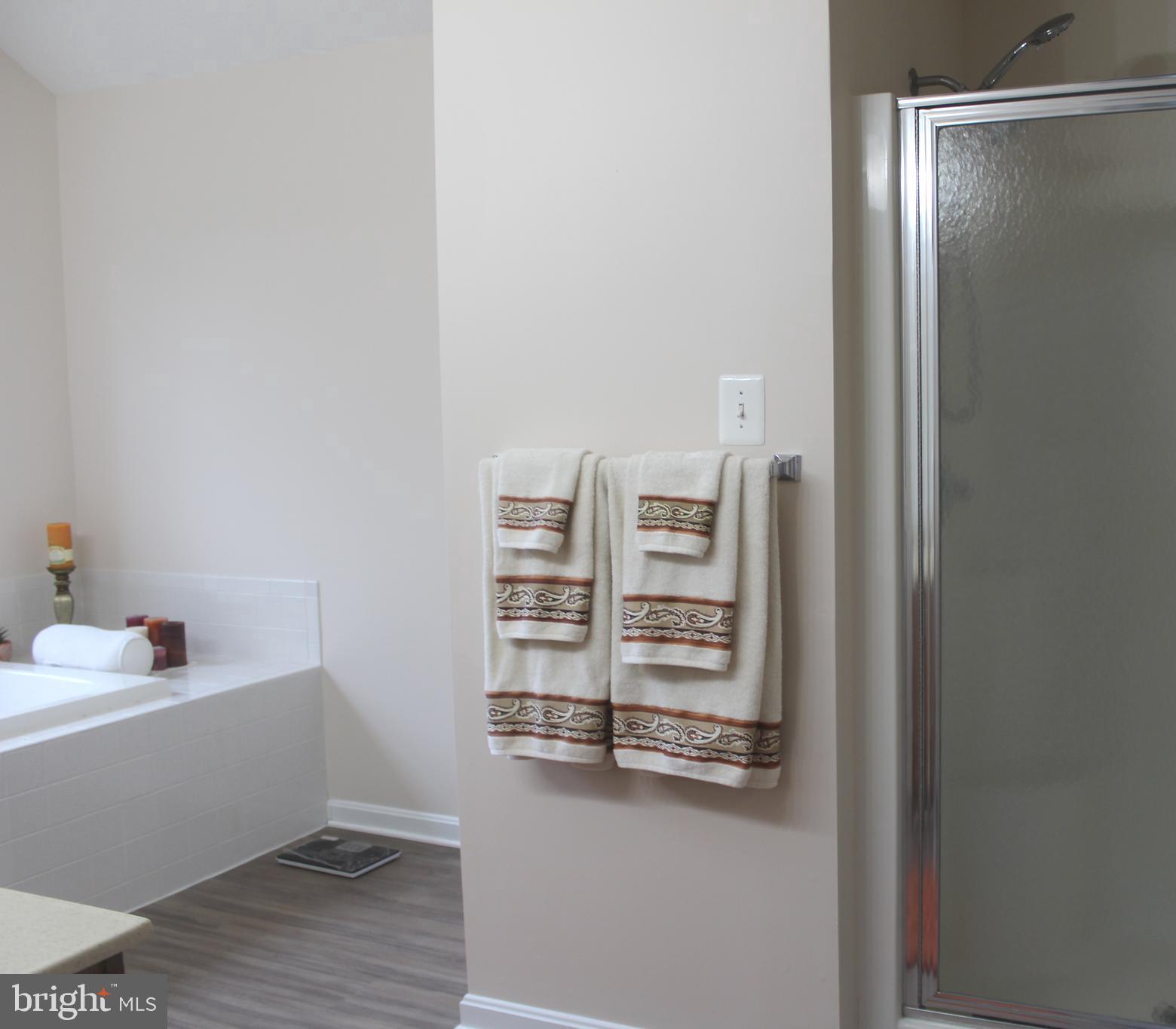 3470 Malcolm Road Brandywine, MD 20613 - Photo 31 of 55 a room with a wooden floor and shoes