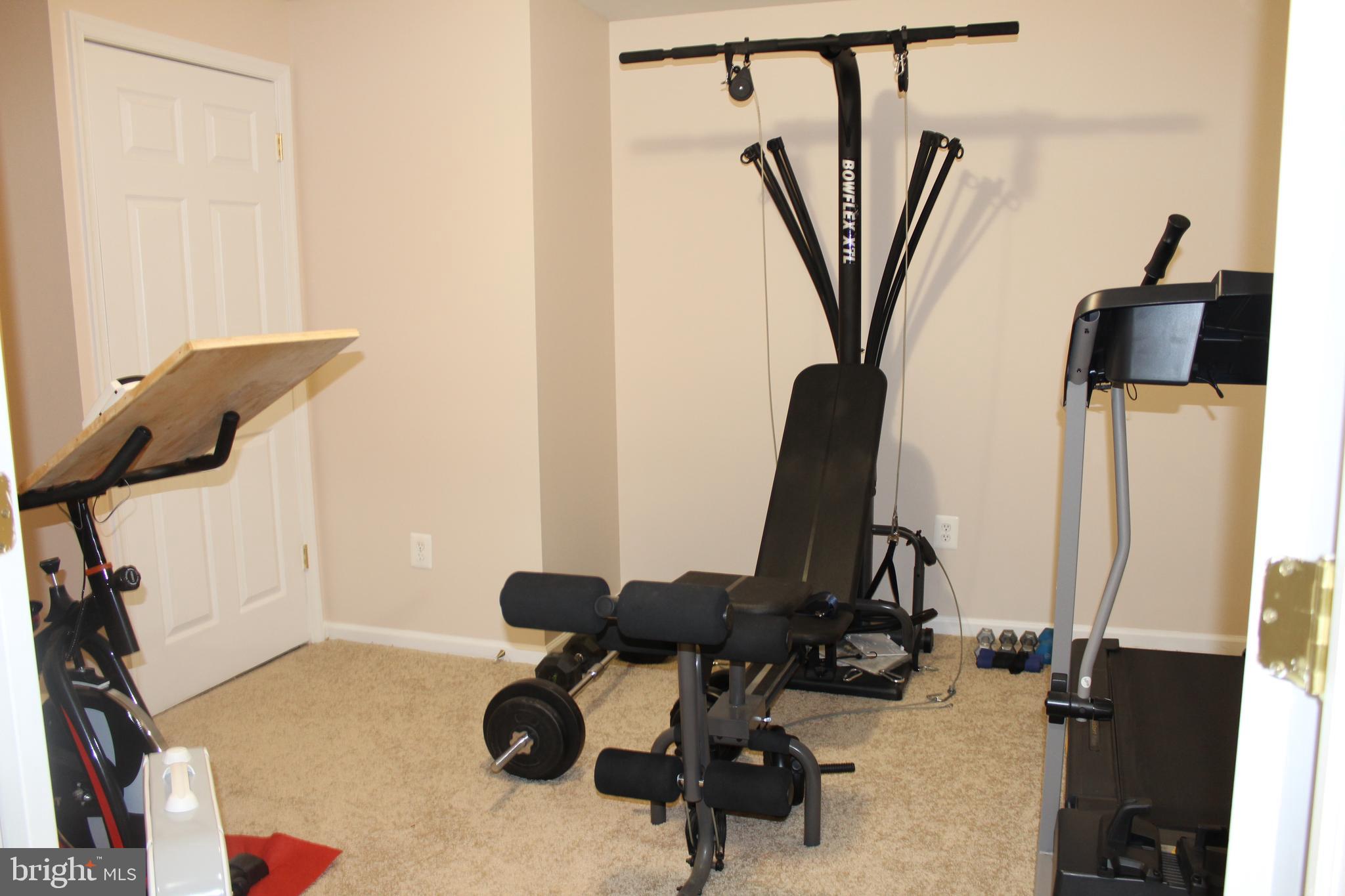 3470 Malcolm Road Brandywine, MD 20613 - Photo 38 of 55 a view of a workspace with furniture and a window