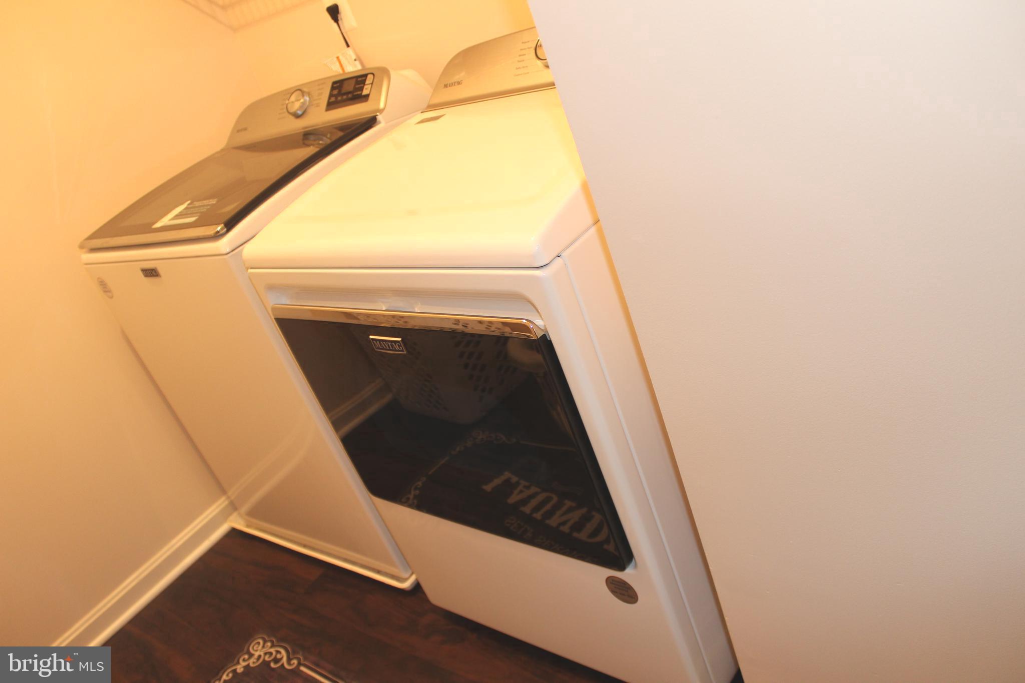 3470 Malcolm Road Brandywine, MD 20613 - Photo 50 of 55 a close up view of washer and dryer