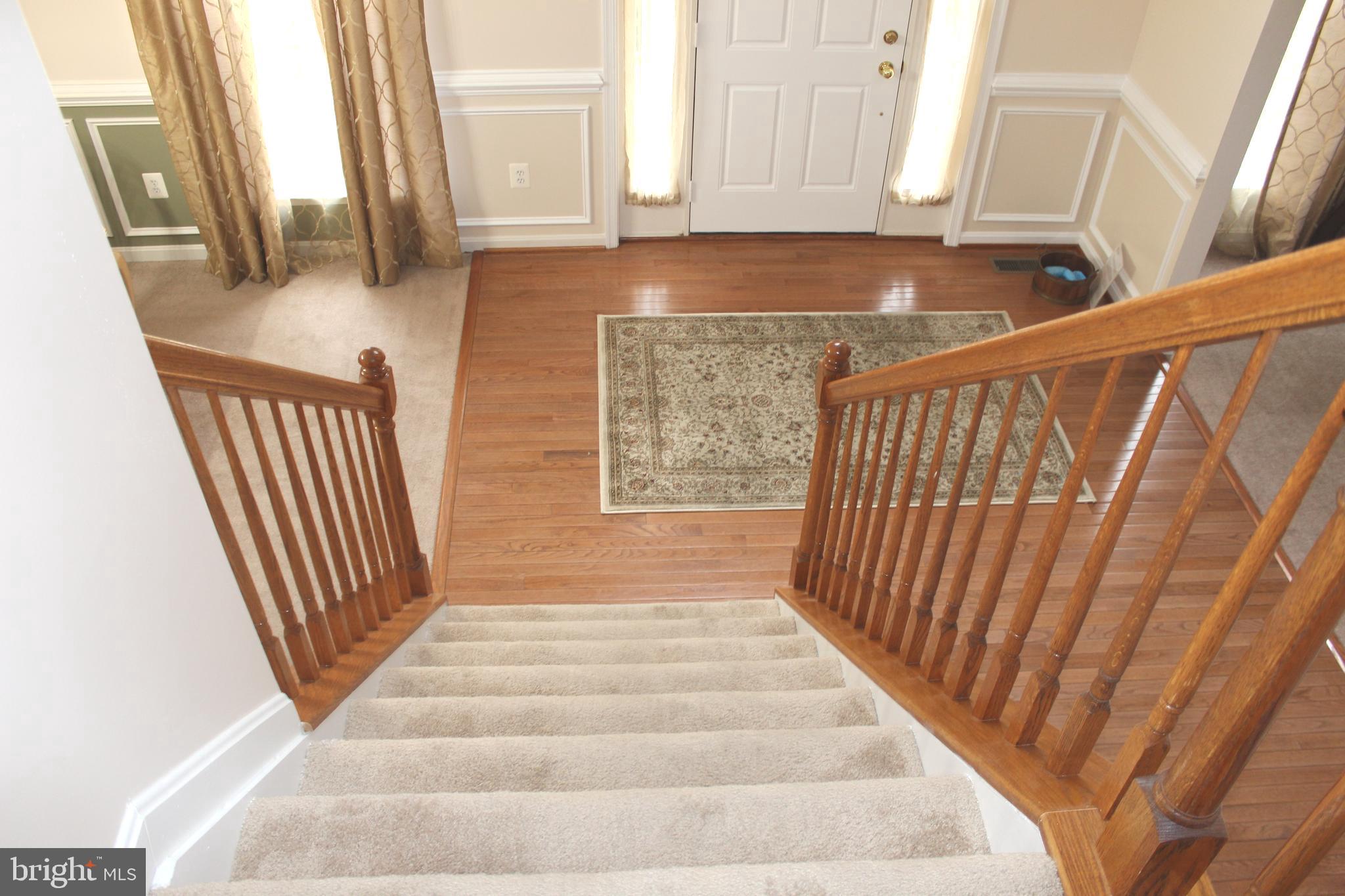 3470 Malcolm Road Brandywine, MD 20613 - Photo 6 of 55 a view of entryway with wooden floor