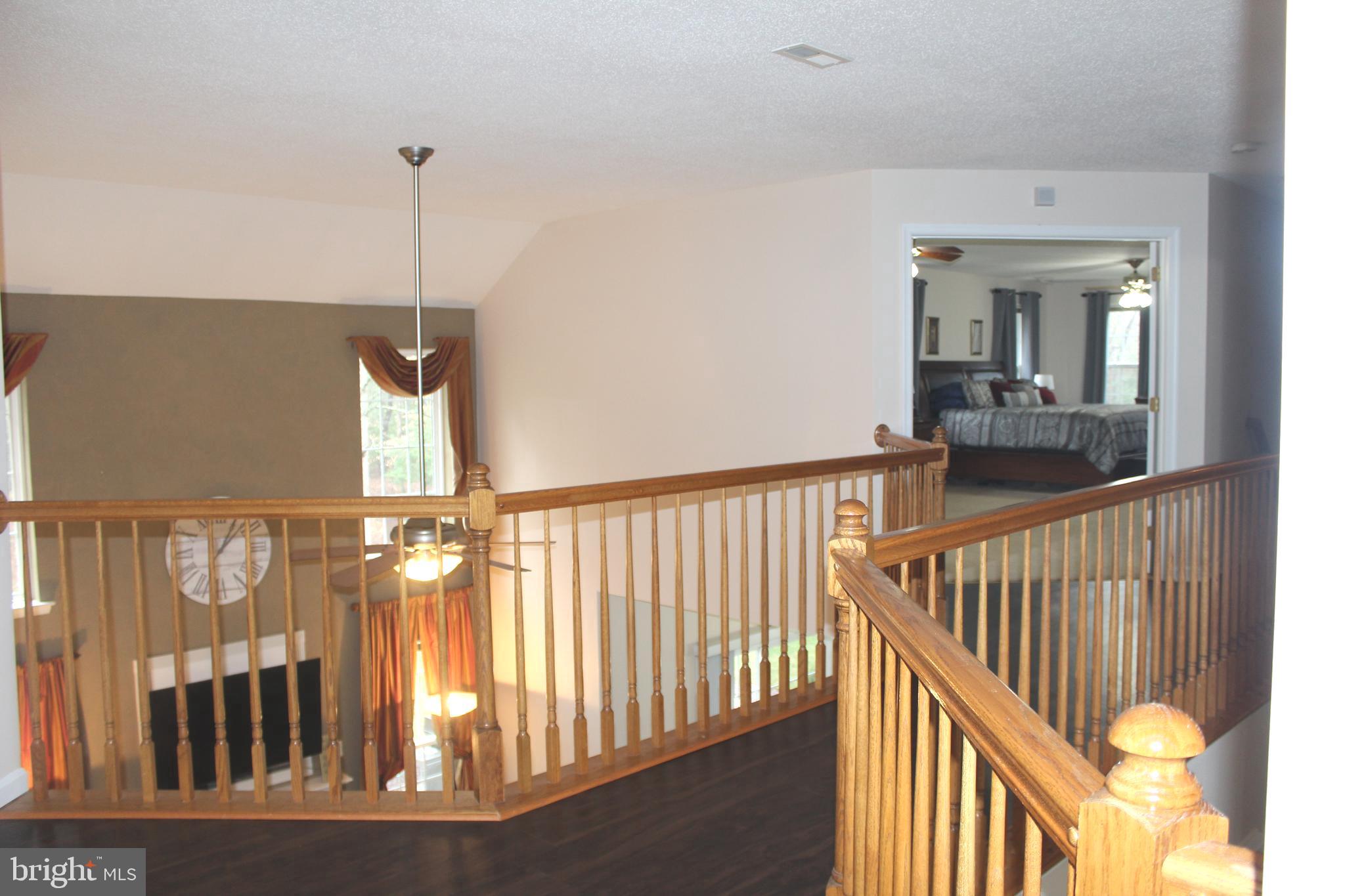 3470 Malcolm Road Brandywine, MD 20613 - Photo 8 of 55 a view of staircase with rug