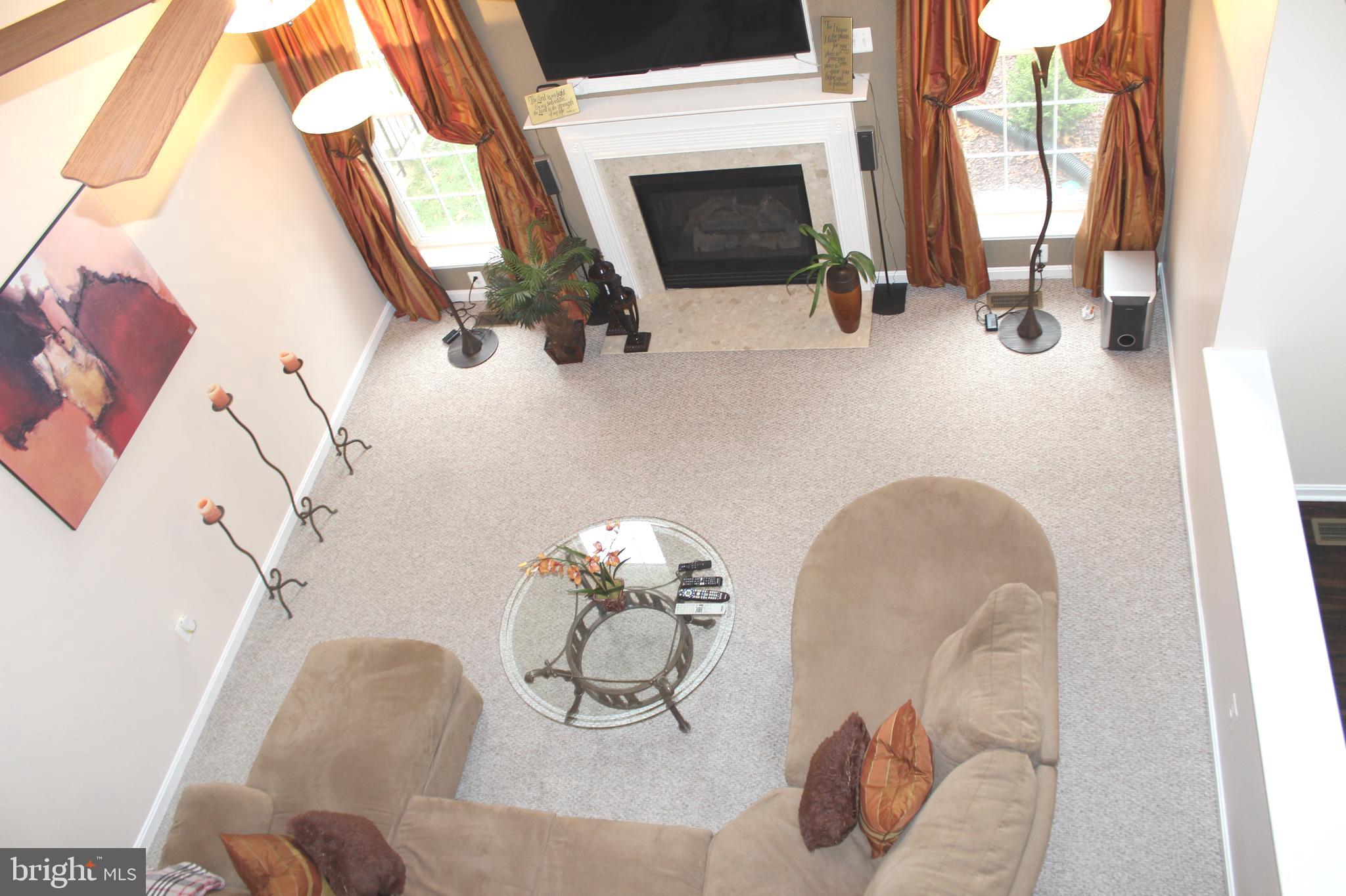 3470 Malcolm Road Brandywine, MD 20613 - Photo 10 of 55 a dining room with fireplace furniture and a mirror