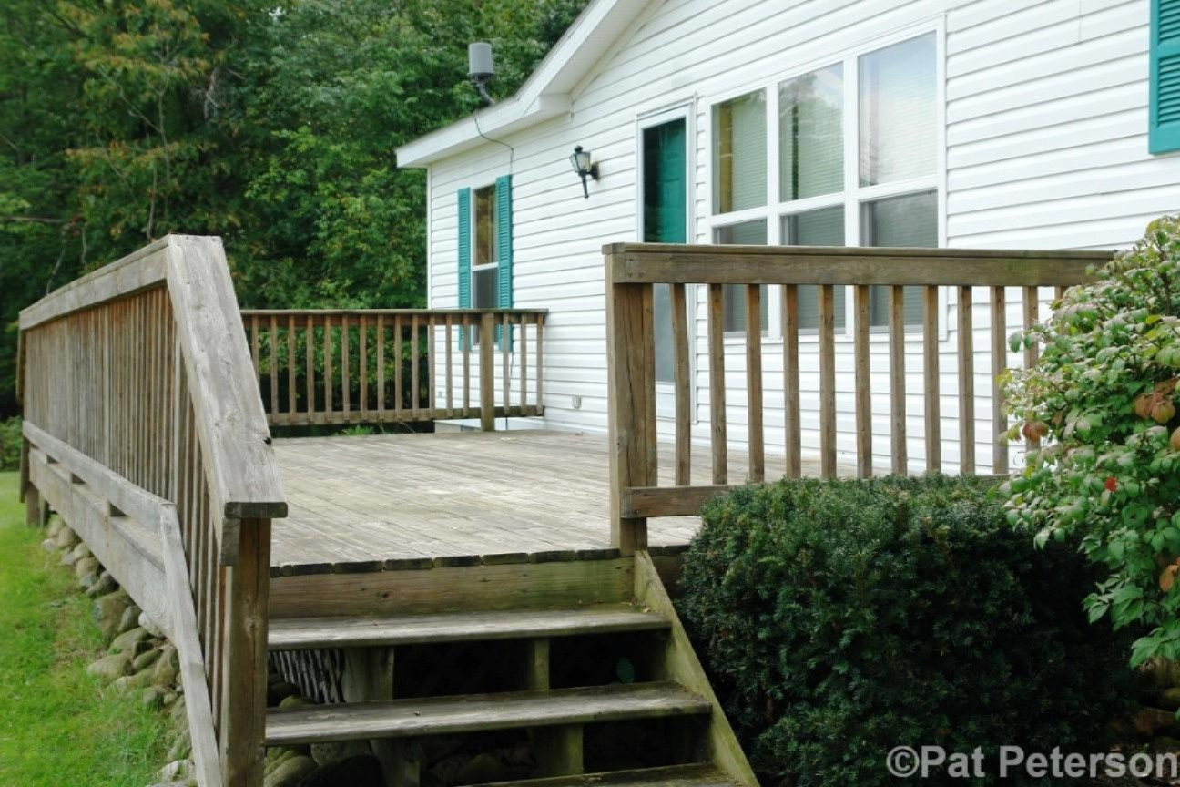 2131 West Hillis Road Stanton, MI 48888 - Photo 20 of 28 Large Deck off Front of House