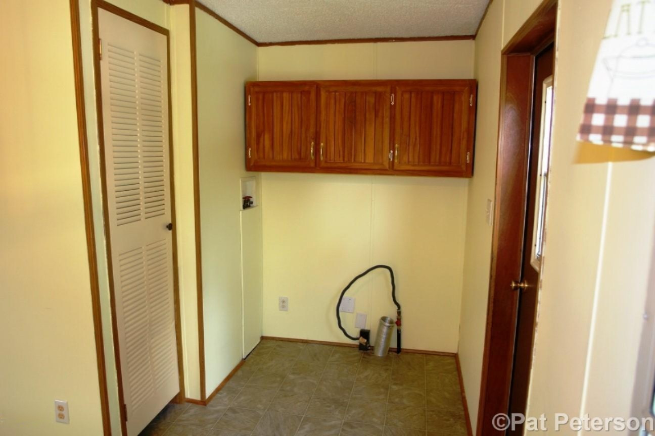 2131 West Hillis Road Stanton, MI 48888 - Photo 6 of 28 Laundry Area
