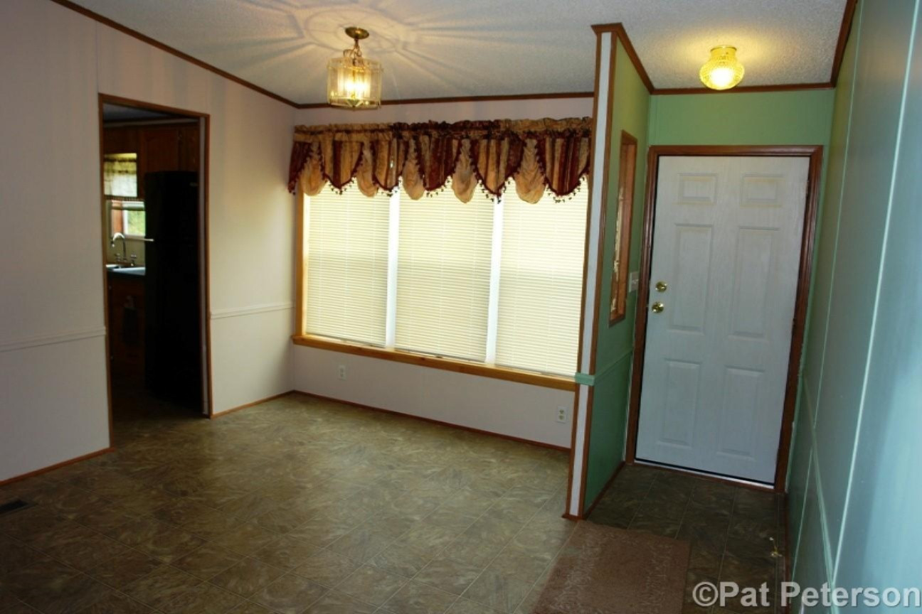2131 West Hillis Road Stanton, MI 48888 - Photo 7 of 28 Dining Area and Front Entrance