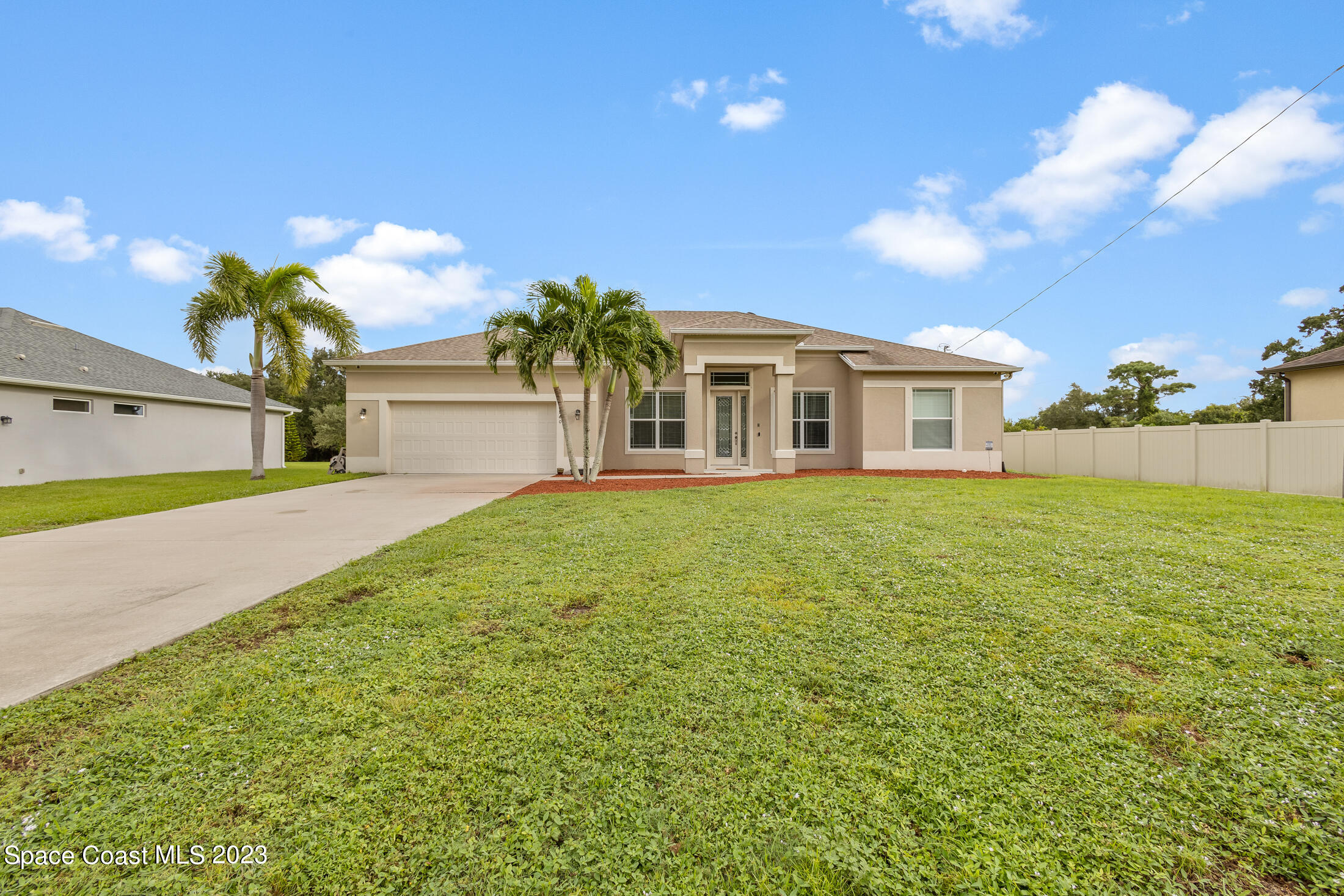 1840 Trimble Road Melbourne, FL 32934 - Photo 2 of 42 a house view with a garden space