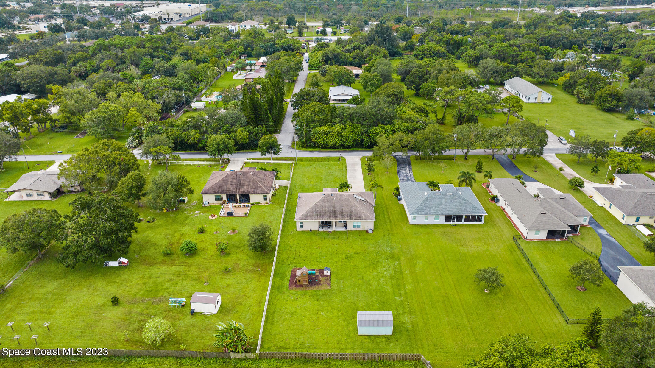 1840 Trimble Road Melbourne, FL 32934 - Photo 39 of 42 a view of a swimming pool with a yard