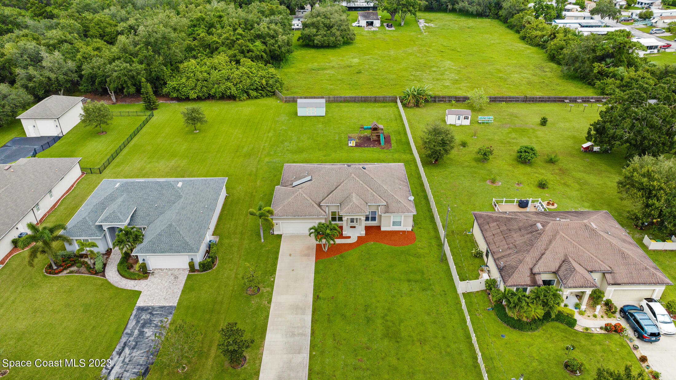 1840 Trimble Road Melbourne, FL 32934 - Photo 42 of 42 an aerial view of a pool