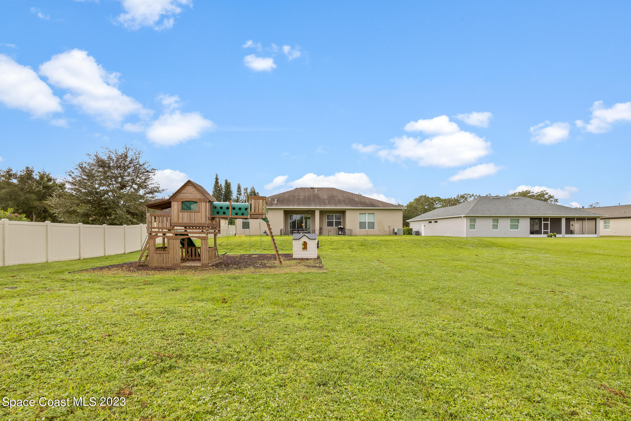 1840 Trimble Road Melbourne, FL 32934 - Photo 6 of 42 a view of a house with swimming pool and porch