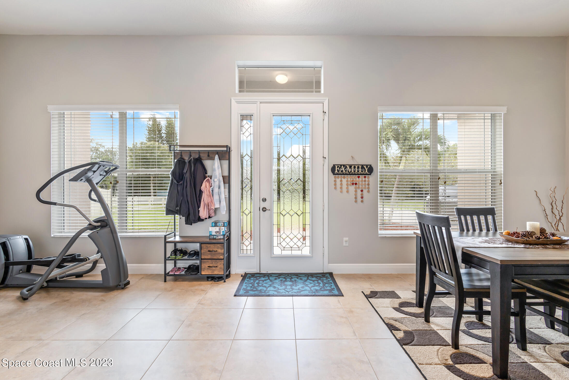 1840 Trimble Road Melbourne, FL 32934 - Photo 10 of 42 a view of a room with gym equipment