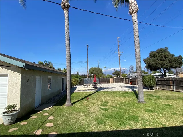 a view of a chairs and tables in the patio