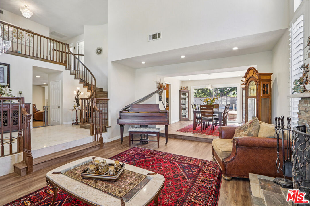 2136 McCrea Road Thousand Oaks, CA 91362 - Photo 18 of 66 a living room with furniture and a wooden floor