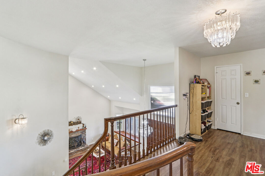 2136 McCrea Road Thousand Oaks, CA 91362 - Photo 47 of 66 a view of a hallway with wooden floor and entryway