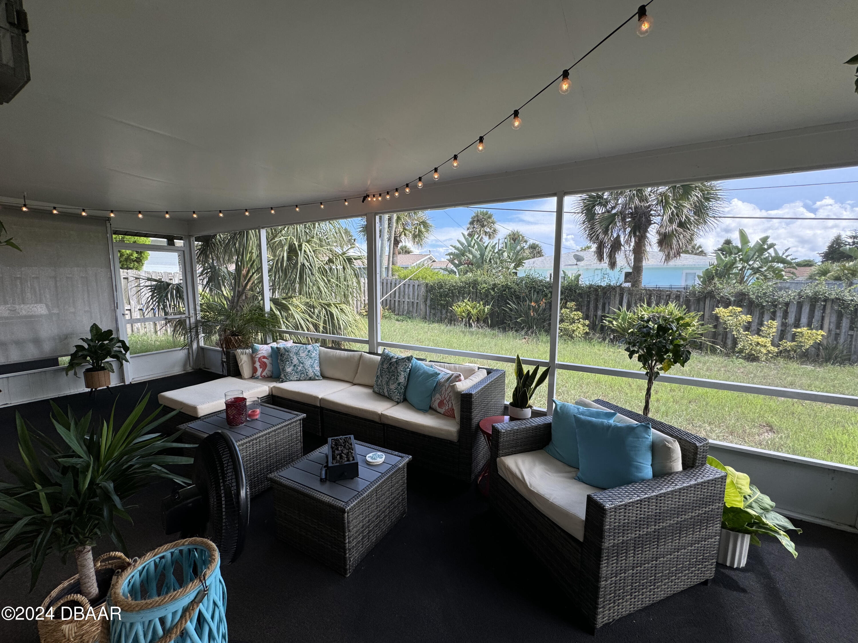 12 Ocean Crest Drive Ormond Beach, FL 32176 - Photo 31 of 31 a living room with furniture and a large window