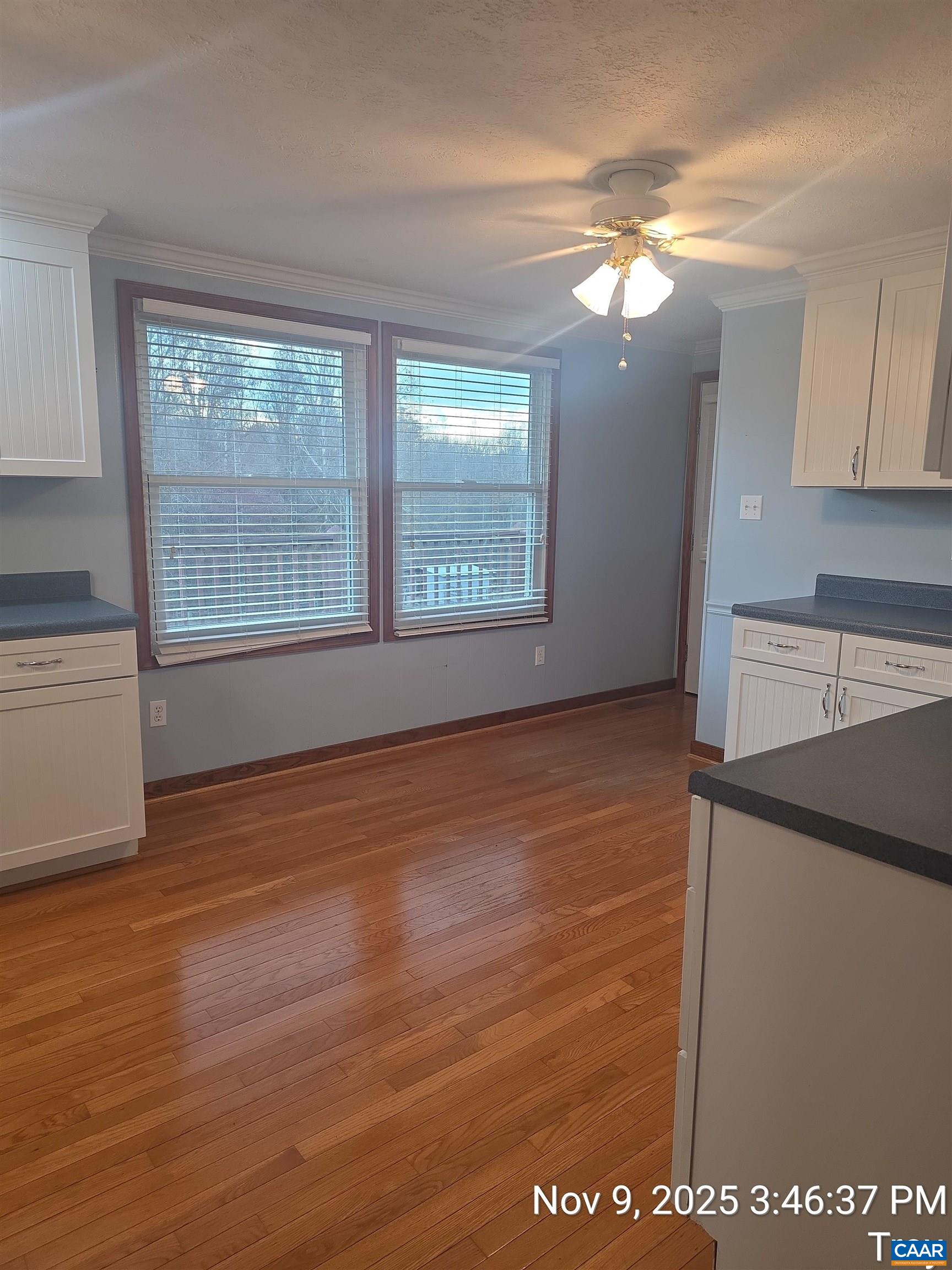 912 Hunters Lodge Road Troy, VA 22974 - Photo 13 of 22 a view of an empty room with wooden floor and a window