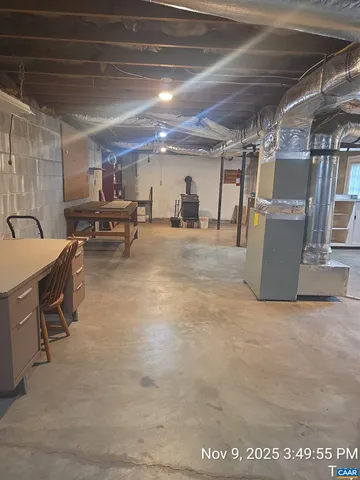 a view of a hallway with seating area