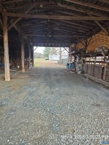 a view of a room with wooden walls