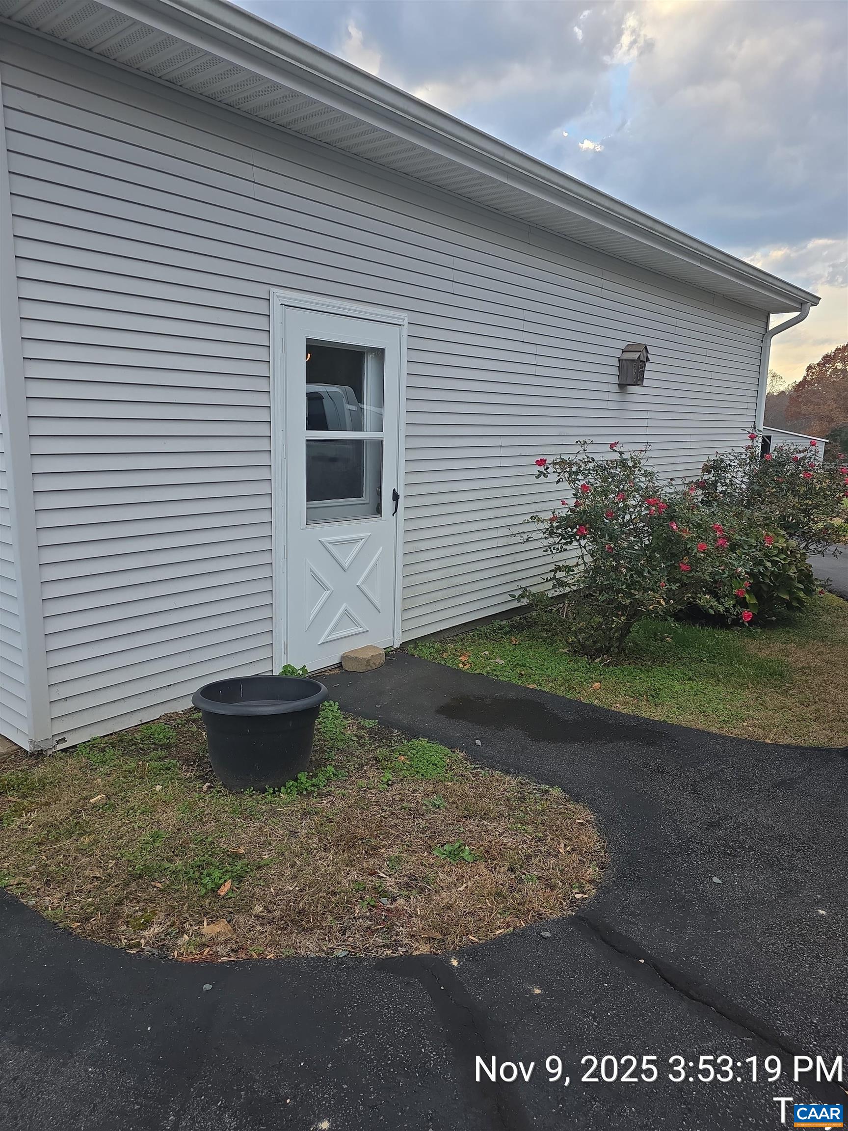 912 Hunters Lodge Road Troy, VA 22974 - Photo 5 of 22 a front view of a house with garden