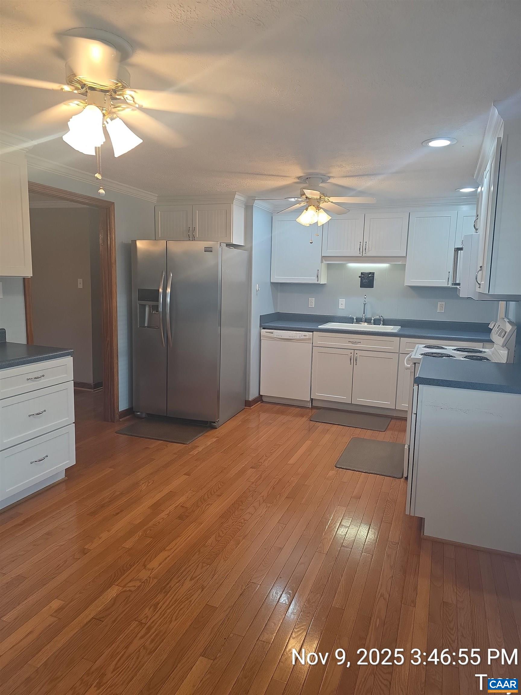912 Hunters Lodge Road Troy, VA 22974 - Photo 10 of 22 a kitchen with stainless steel appliances granite countertop a stove a sink and a refrigerator