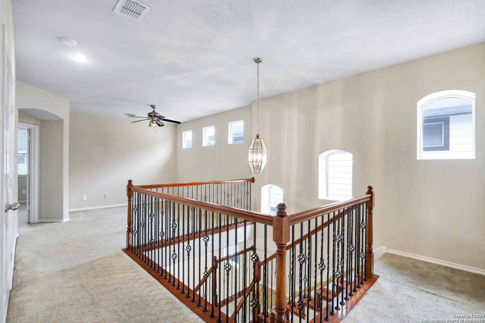 1331 Nicholas Manor San Antonio, TX 78258 - Photo 13 of 26 a view of a hallway with entryway to a window