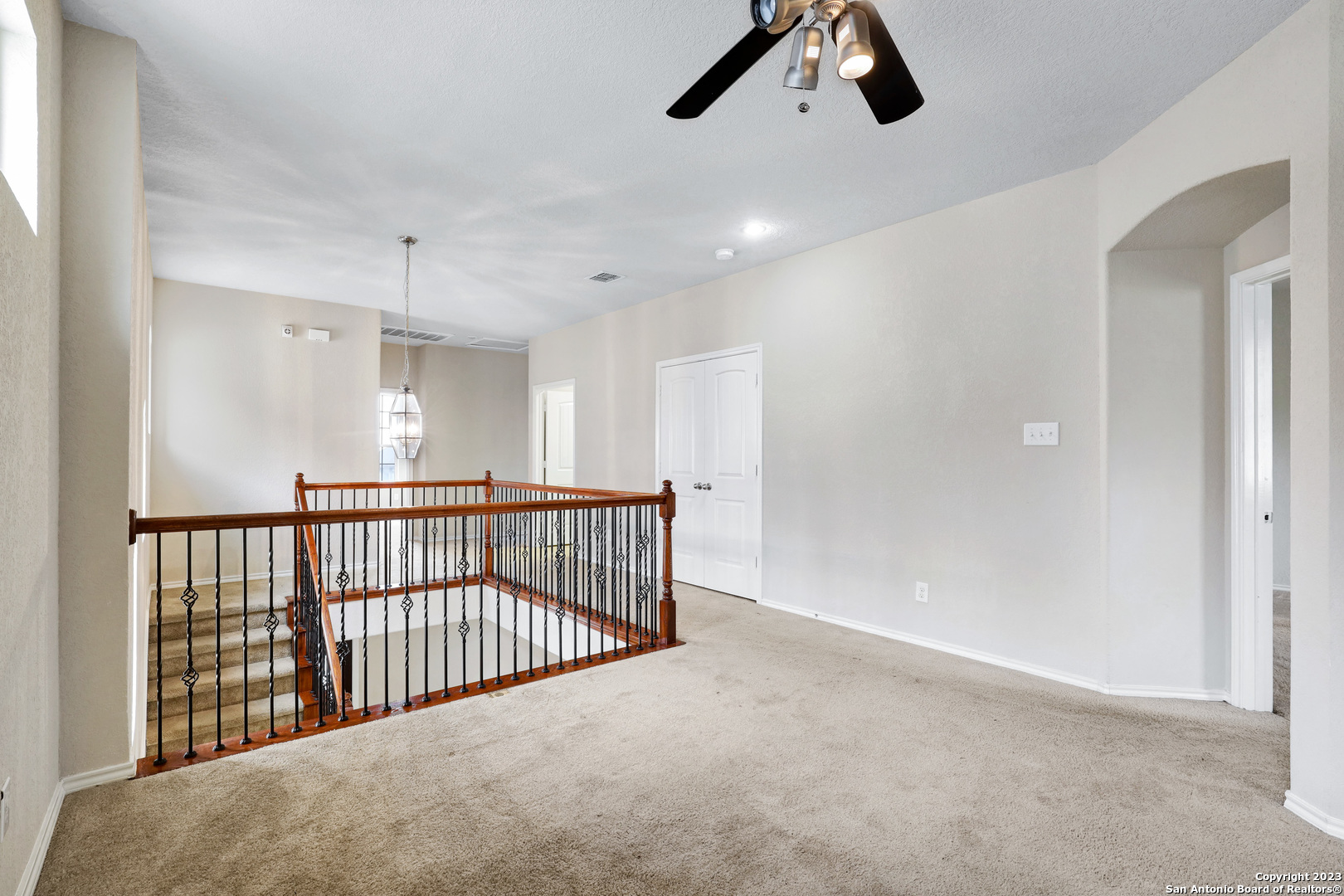 1331 Nicholas Manor San Antonio, TX 78258 - Photo 14 of 26 a view of a hallway with a projector