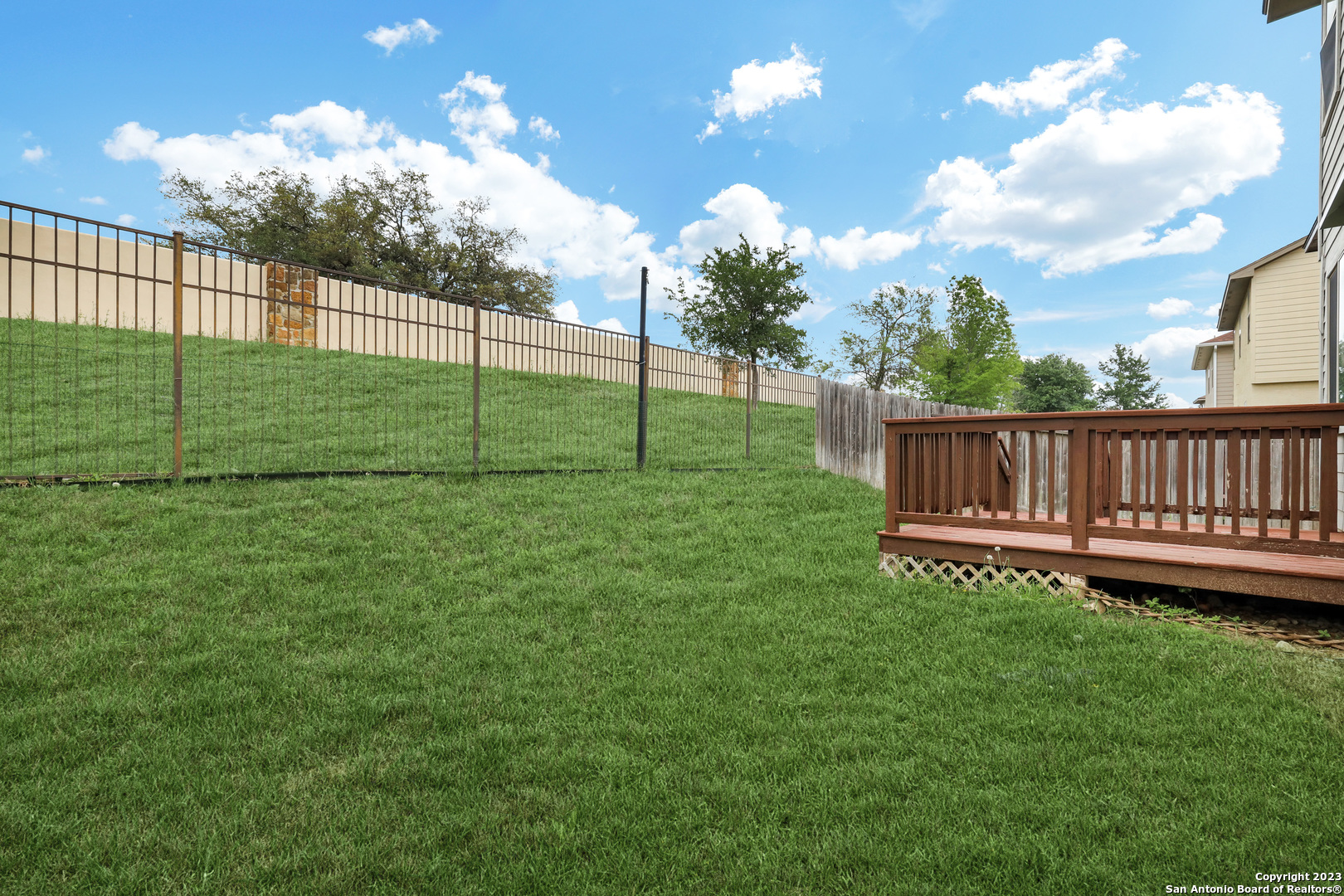 1331 Nicholas Manor San Antonio, TX 78258 - Photo 24 of 26 a view of a backyard with a garden