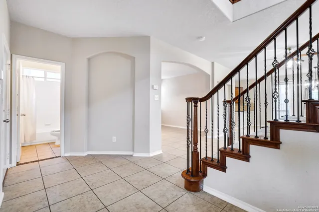 a view of an entryway with wooden floor