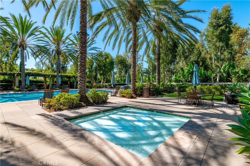 105 Hallmark Irvine, CA 92620 - Photo 19 of 32 a view of a park with swings and palm trees
