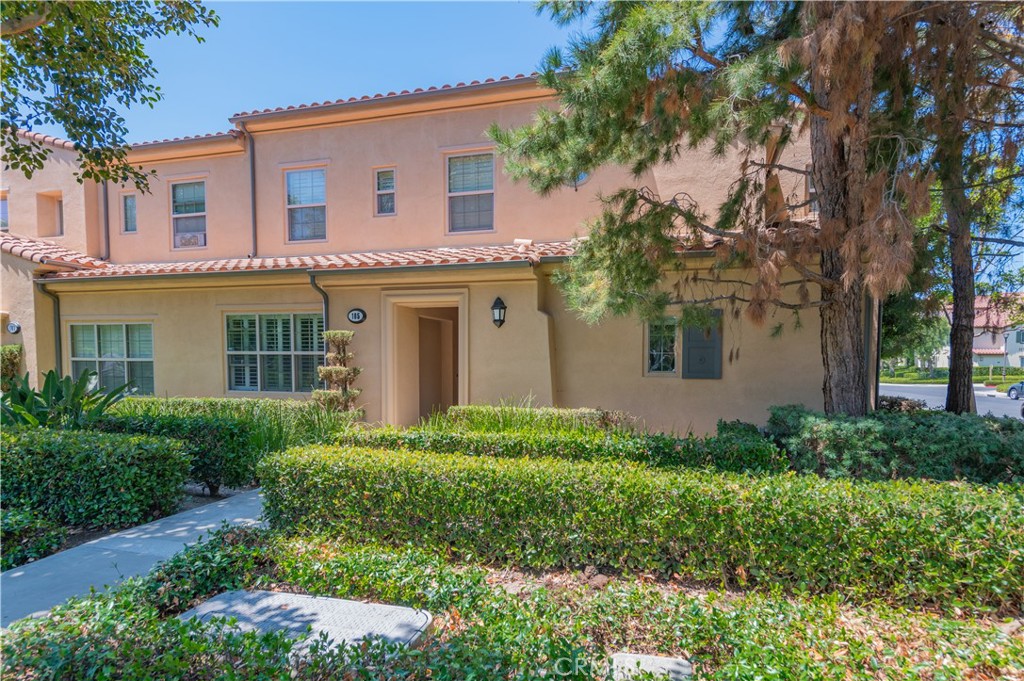 105 Hallmark Irvine, CA 92620 - Photo 2 of 32 front view of a house with a yard