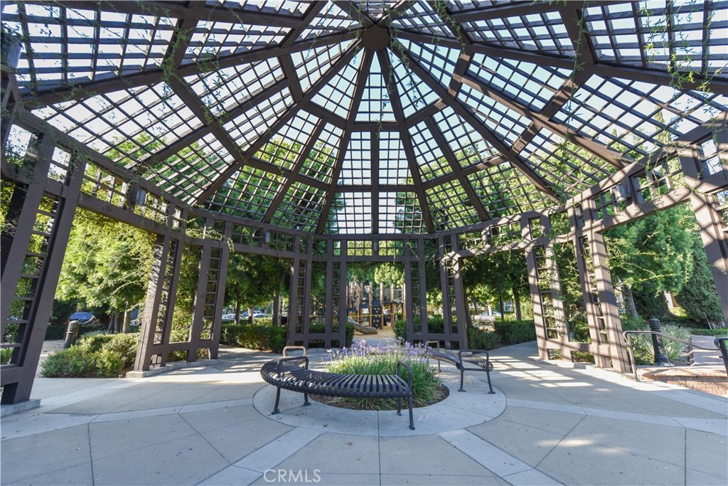 105 Hallmark Irvine, CA 92620 - Photo 24 of 32 a view of a patio with couches and table and chairs and potted plants