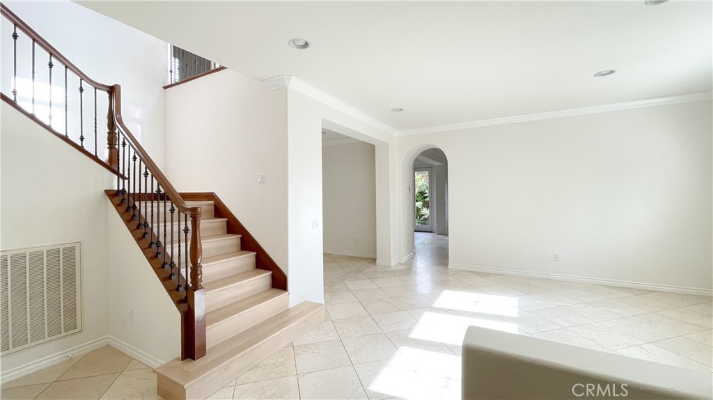 21 Vine Irvine, CA 92620 - Photo 12 of 37 a view of staircase with white walls and stairs