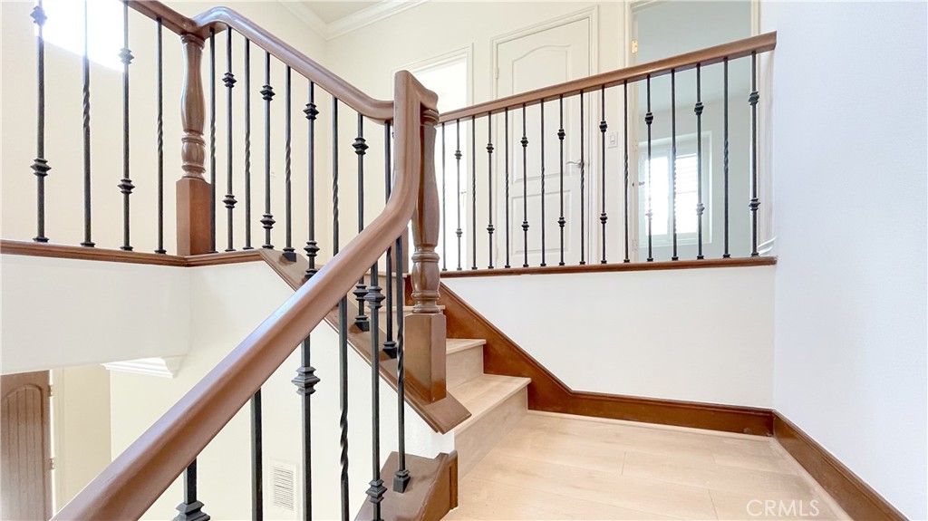21 Vine Irvine, CA 92620 - Photo 19 of 37 a view of staircase with railing and white walls