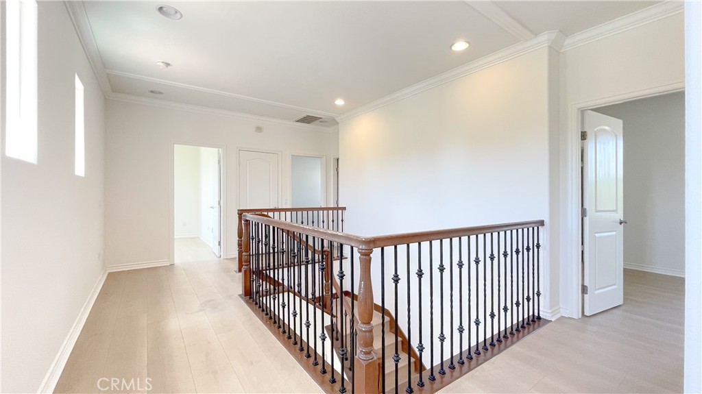 21 Vine Irvine, CA 92620 - Photo 20 of 37 a view of a hallway with wooden floor