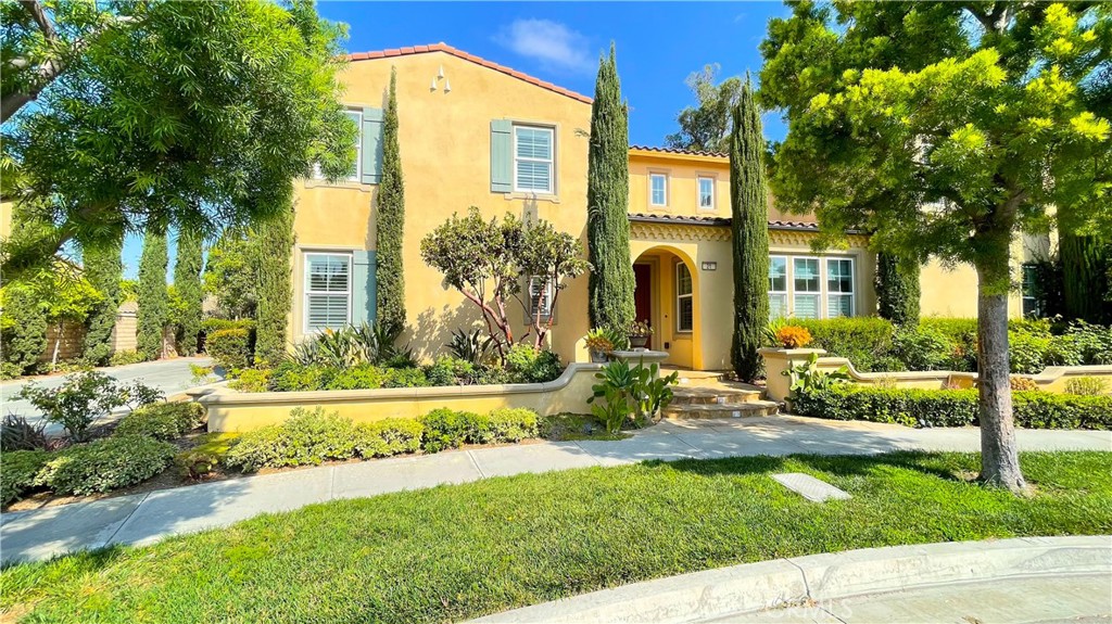 21 Vine Irvine, CA 92620 - Photo 3 of 37 a front view of a house with a yard