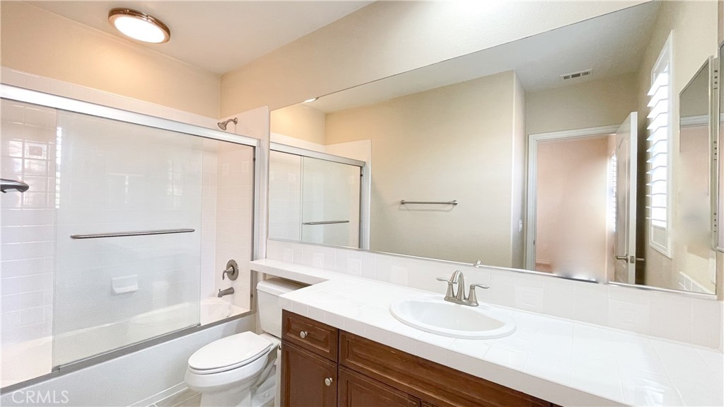 21 Vine Irvine, CA 92620 - Photo 35 of 37 a bathroom with a sink toilet and shower