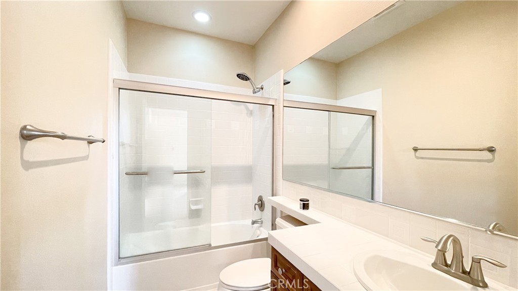 21 Vine Irvine, CA 92620 - Photo 36 of 37 a bathroom with a sink toilet and shower