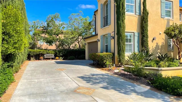 a view of a building with a yard