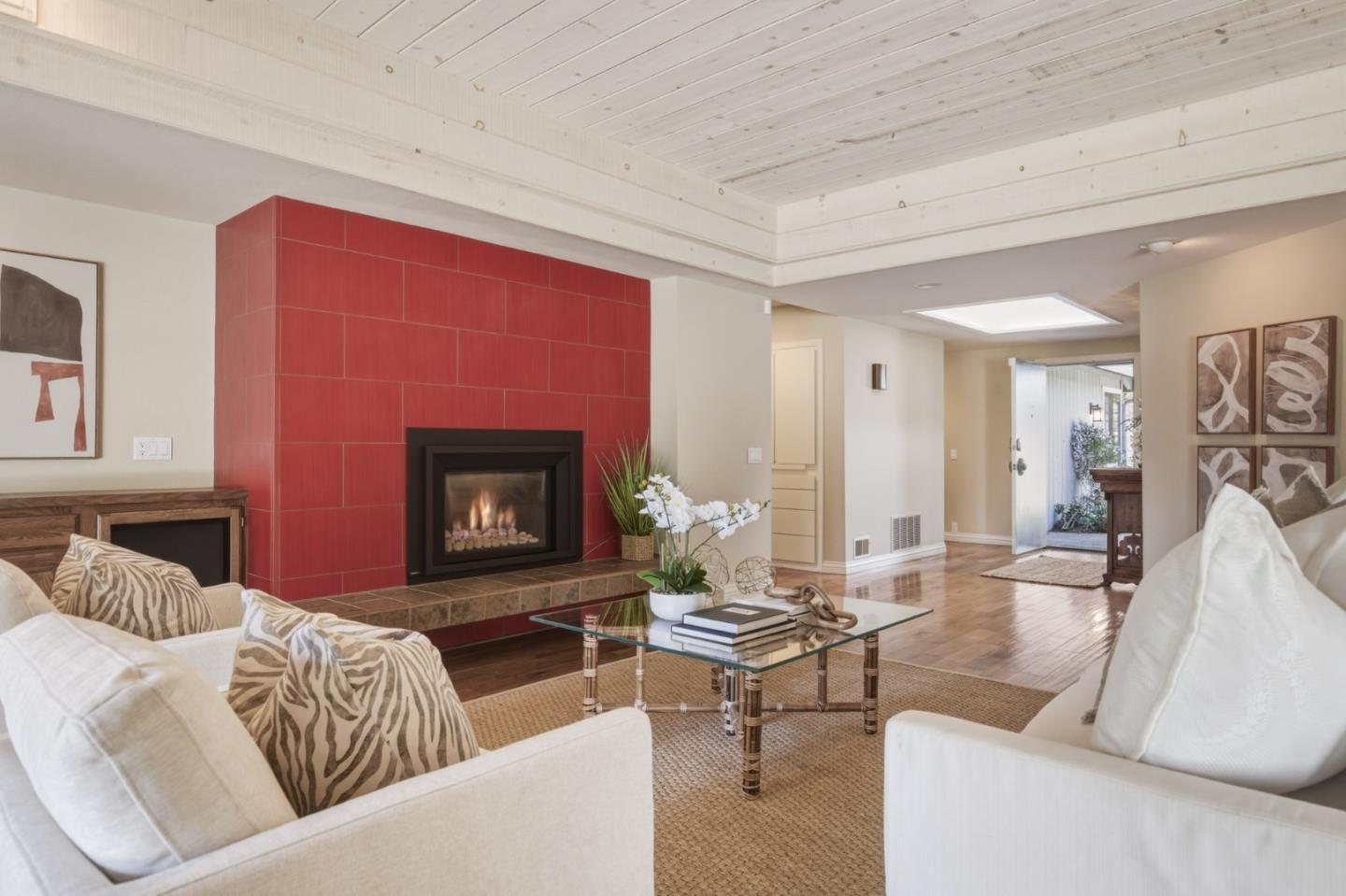 1057 Broncho Road Pebble Beach, CA 93953 - Photo 11 of 21 a living room with furniture and a fireplace